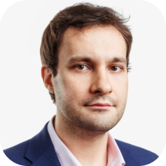 A portrait of Gaidar Magdanurov, a team member.